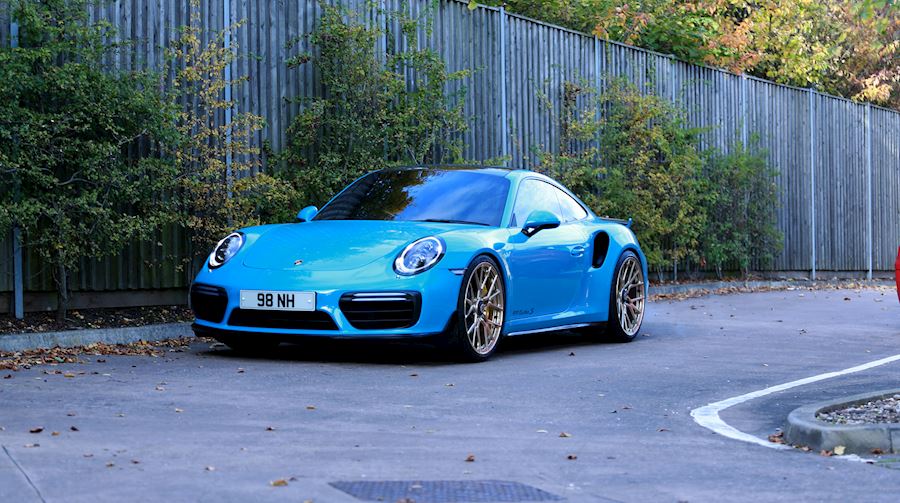 Porsche 991 Turbo S installed with Vossen Forged MX3 in Polished Patina Gold