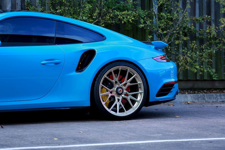 Porsche 991 Turbo S installed with Vossen Forged MX3 in Polished Patina Gold