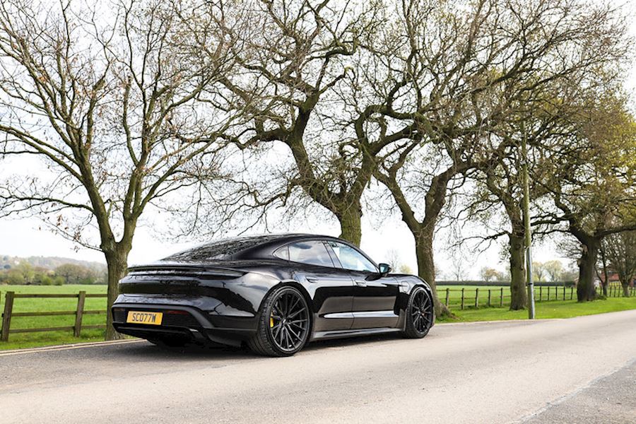 Porsche Taycan Turbo lowered and installed with Vossen HF4T in Satin Black