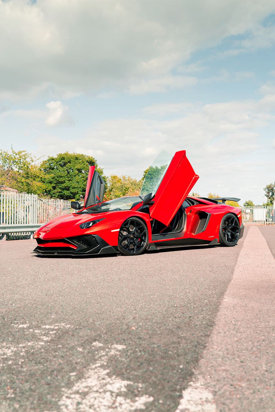 Lamborghini Aventador installed with Vossen x Novitec NL4 wheels in Gloss Black