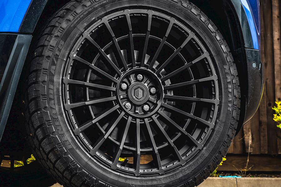Land Rover Defender 110 installed with Urban WX-3 wheels finished in Satin Black