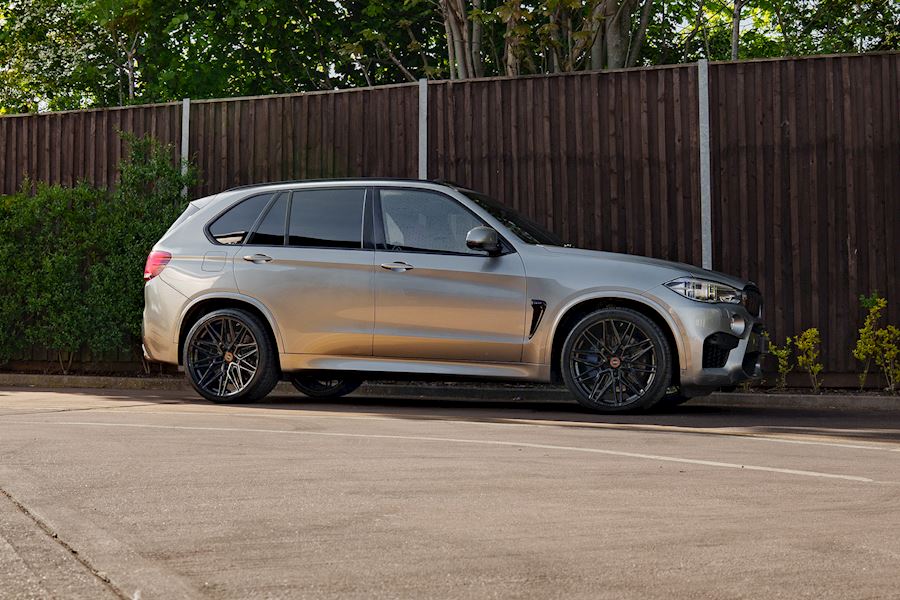 BMW X5m Installed with Vossen HF-7 wheels finished in Gloss Black 22x10.5 Deep 22x12 Super Deep