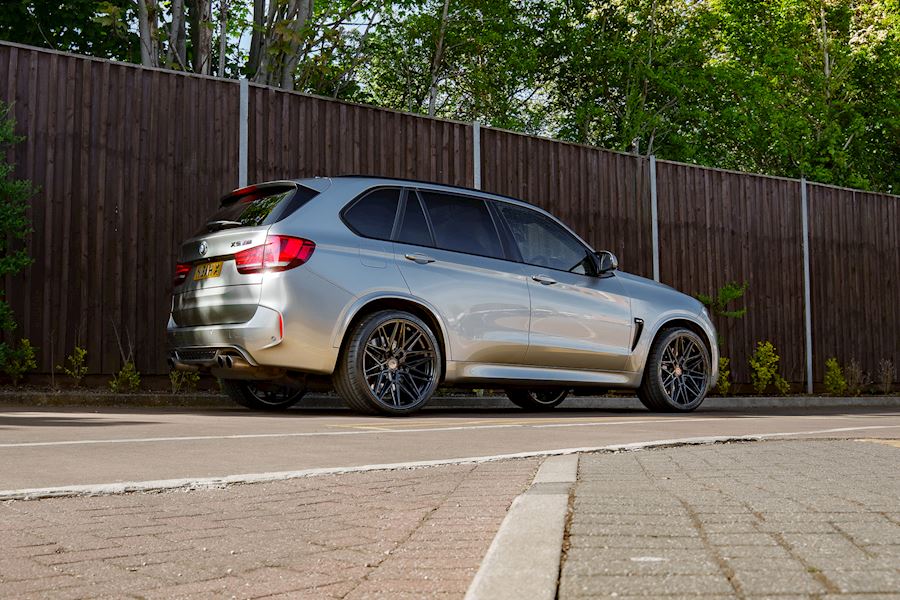 BMW X5m Installed with Vossen HF-7 wheels finished in Gloss Black 22x10.5 Deep 22x12 Super Deep
