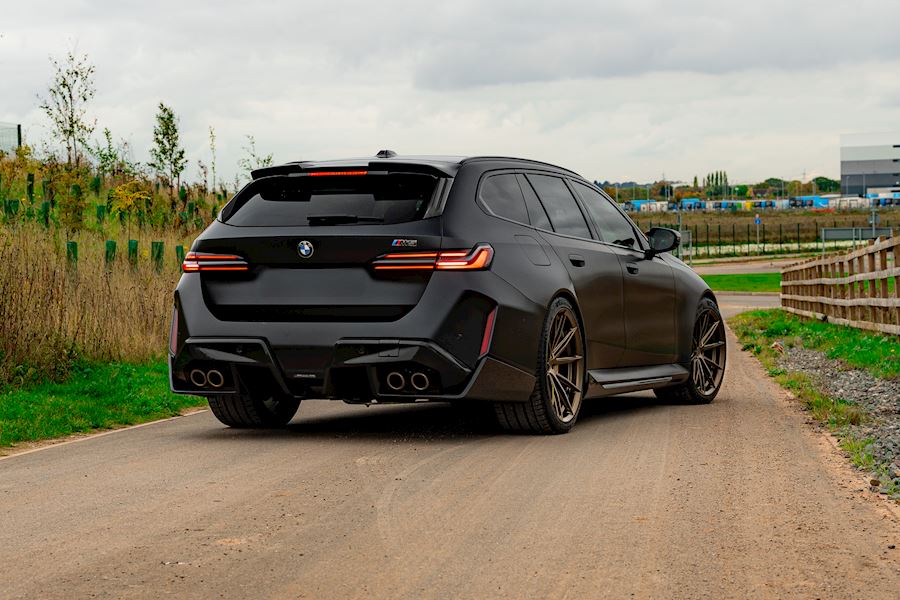 BMW G99 M5 Installed with Vossen HFX-2 wheels finished in Satin Bronze 21x10.5 Deep 22x21 Super Deep