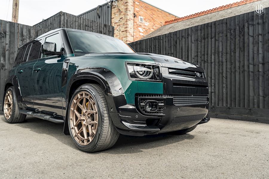 Land Rover Defender 110 installed with Vossen HFX-1 wheels finished in Satin Bronze 23x10.5 Mid Front, Superdeep Rear